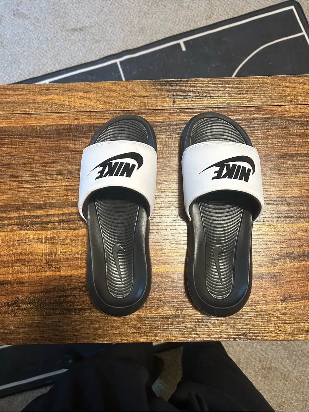 Nike Black and White Slide Sandals with Logo Strap